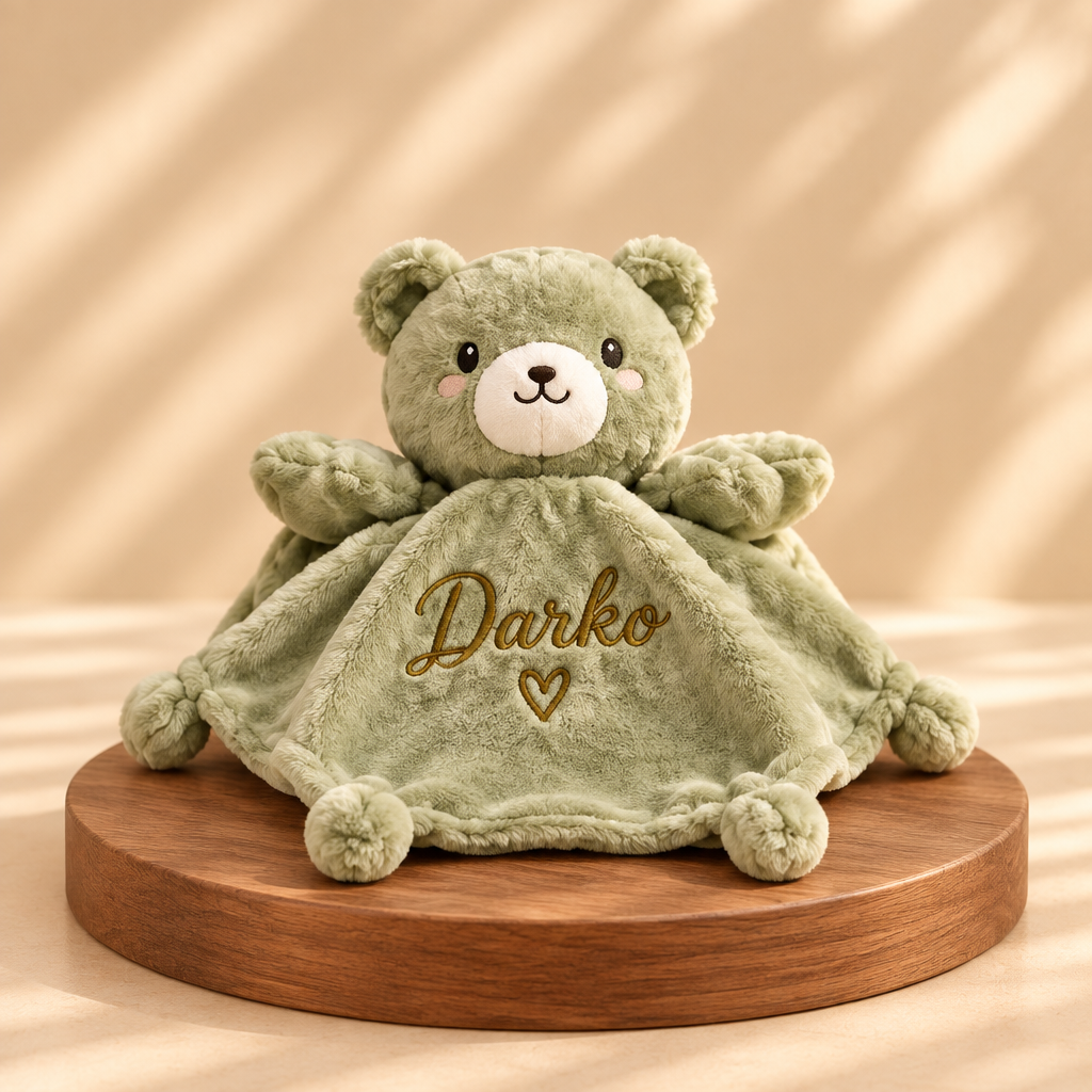 Doudou ours vert
