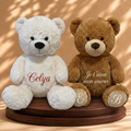 Teddy blanc personnalisé en rouge pailleté et Teddy marron avec initiales sur les pieds